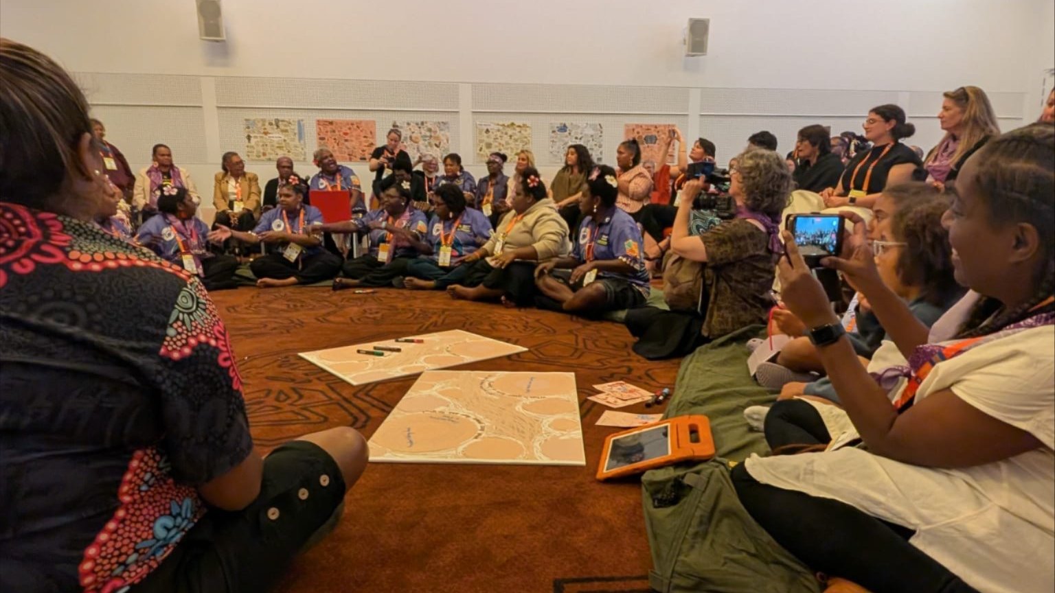First Nations women and community members seated in a circle during a workshop at the Women Deliver 2026 conference in Melbourne.
