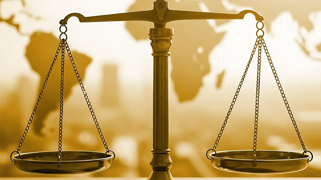 Graphic of a weighing scale in front of a map 