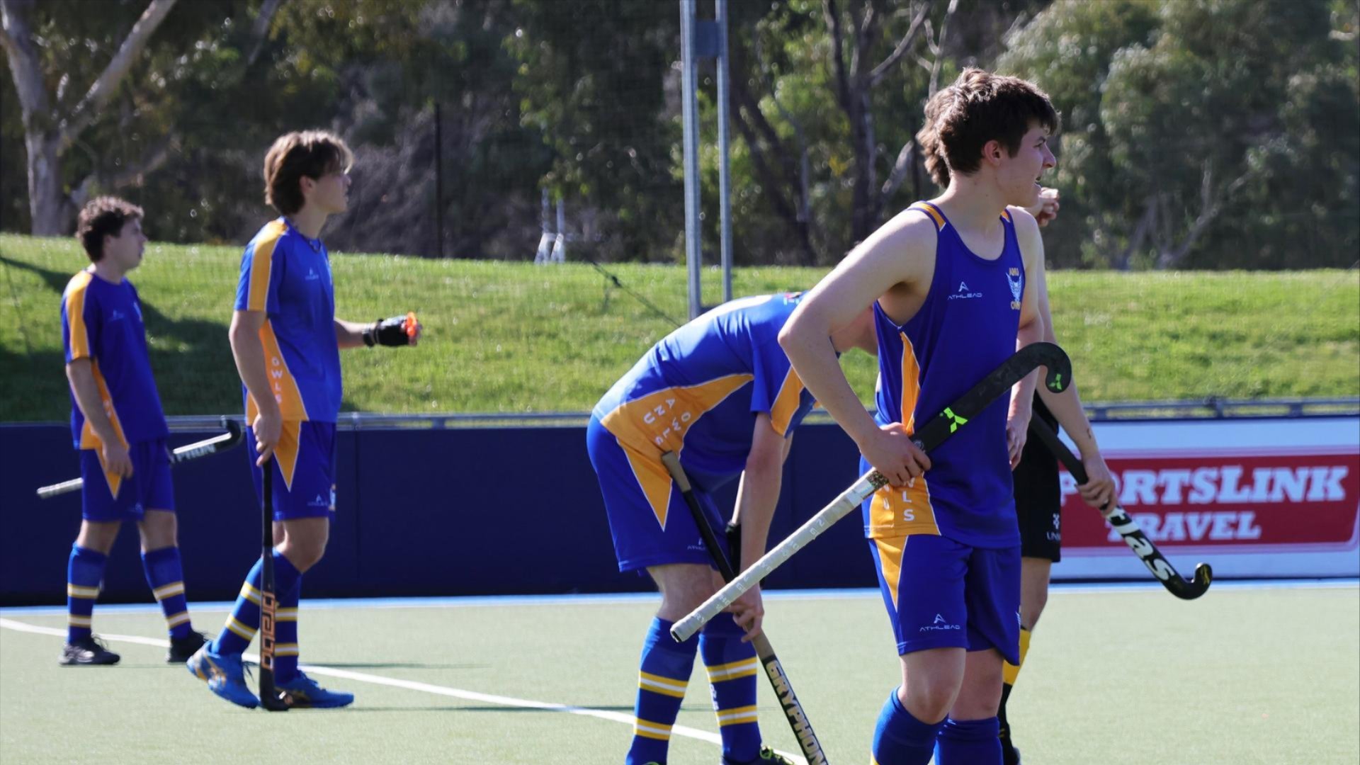 Students playing hockey