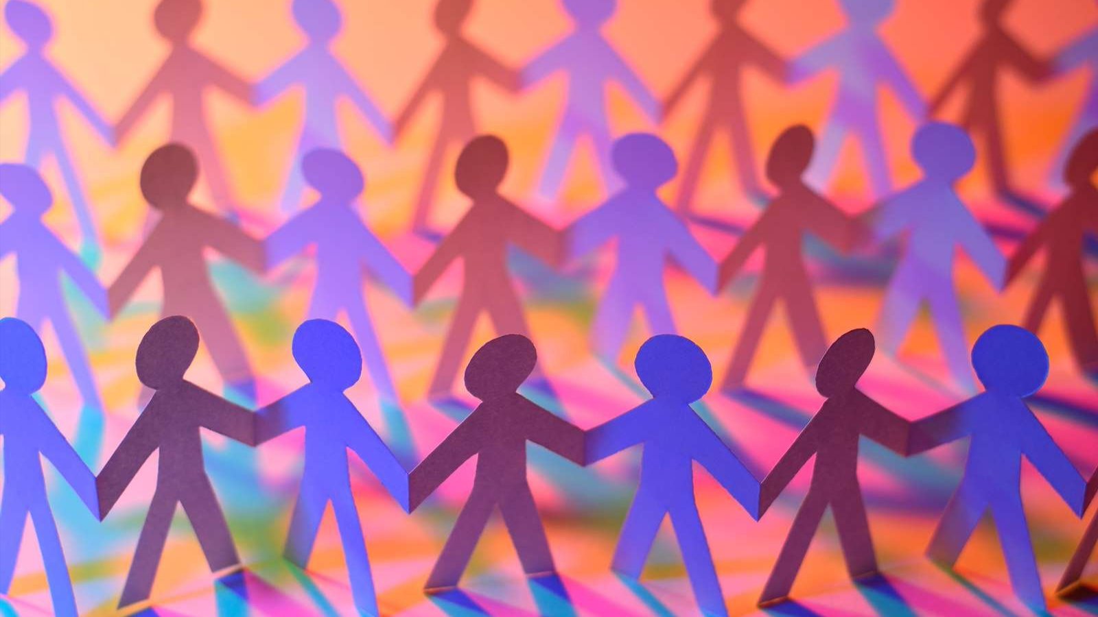 Cutout stickmen holding hands