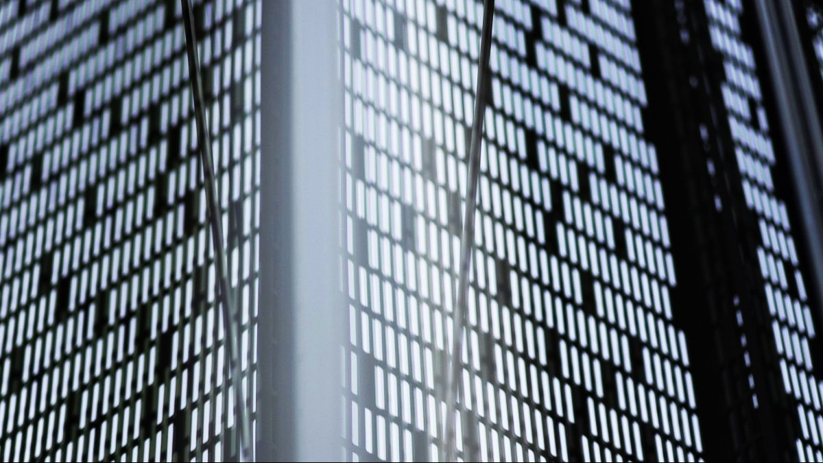 Close-up of coded metal panels on the Hanna Neumann Building.